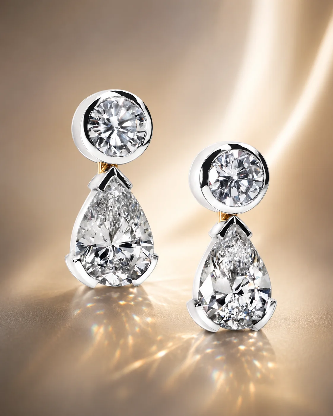 Pear-shape diamond earrings — a matched pair