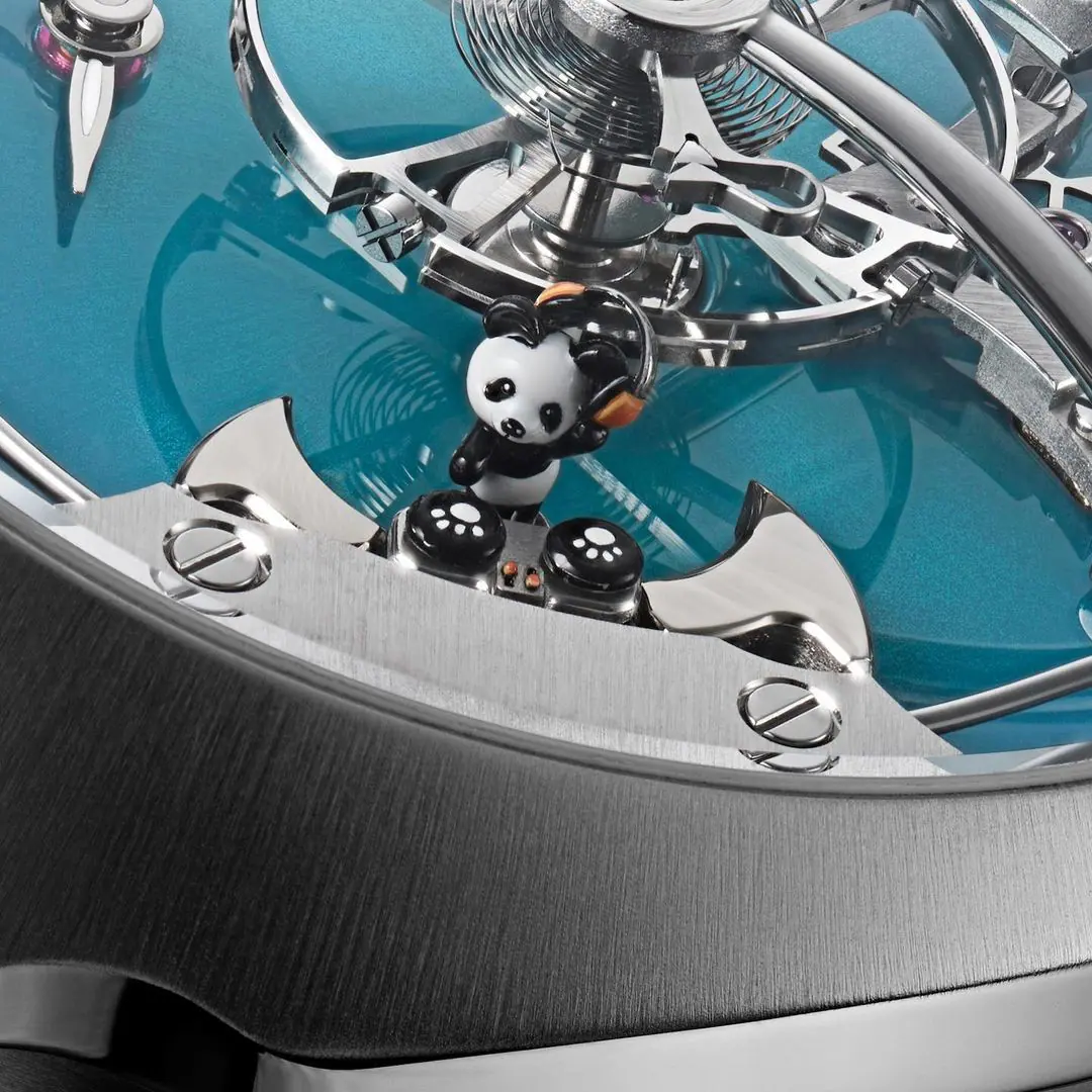 The panda and turntables on the blue dial