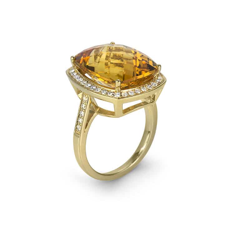 Yellow Gold diamond between white diamond gold ring