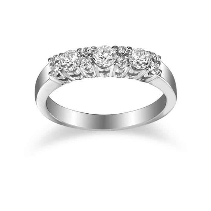 3 Diamond Stones between white diamond engagement ring