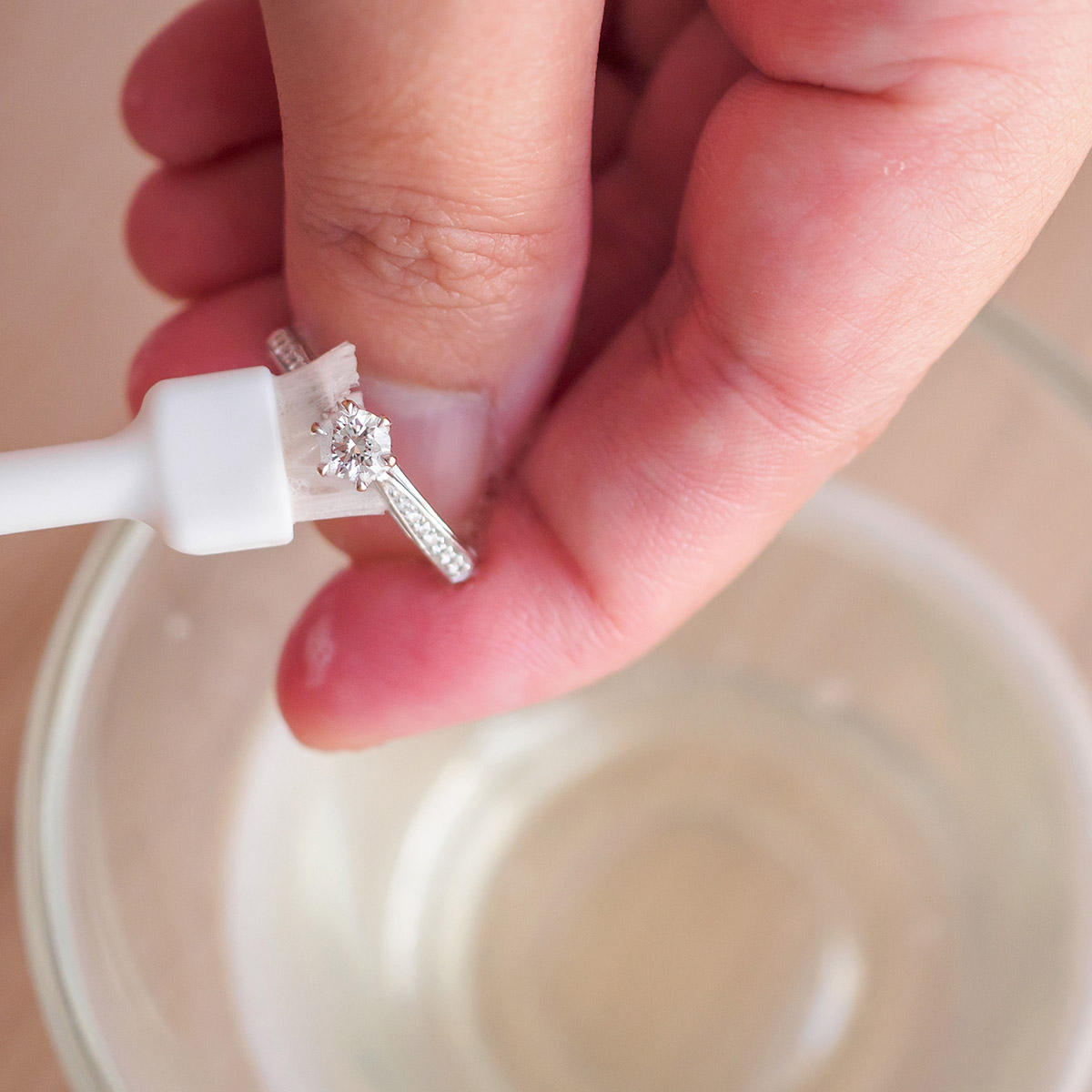 Cleaning and polishing vintage jewelry diamond ring at Palladio in Vancouver